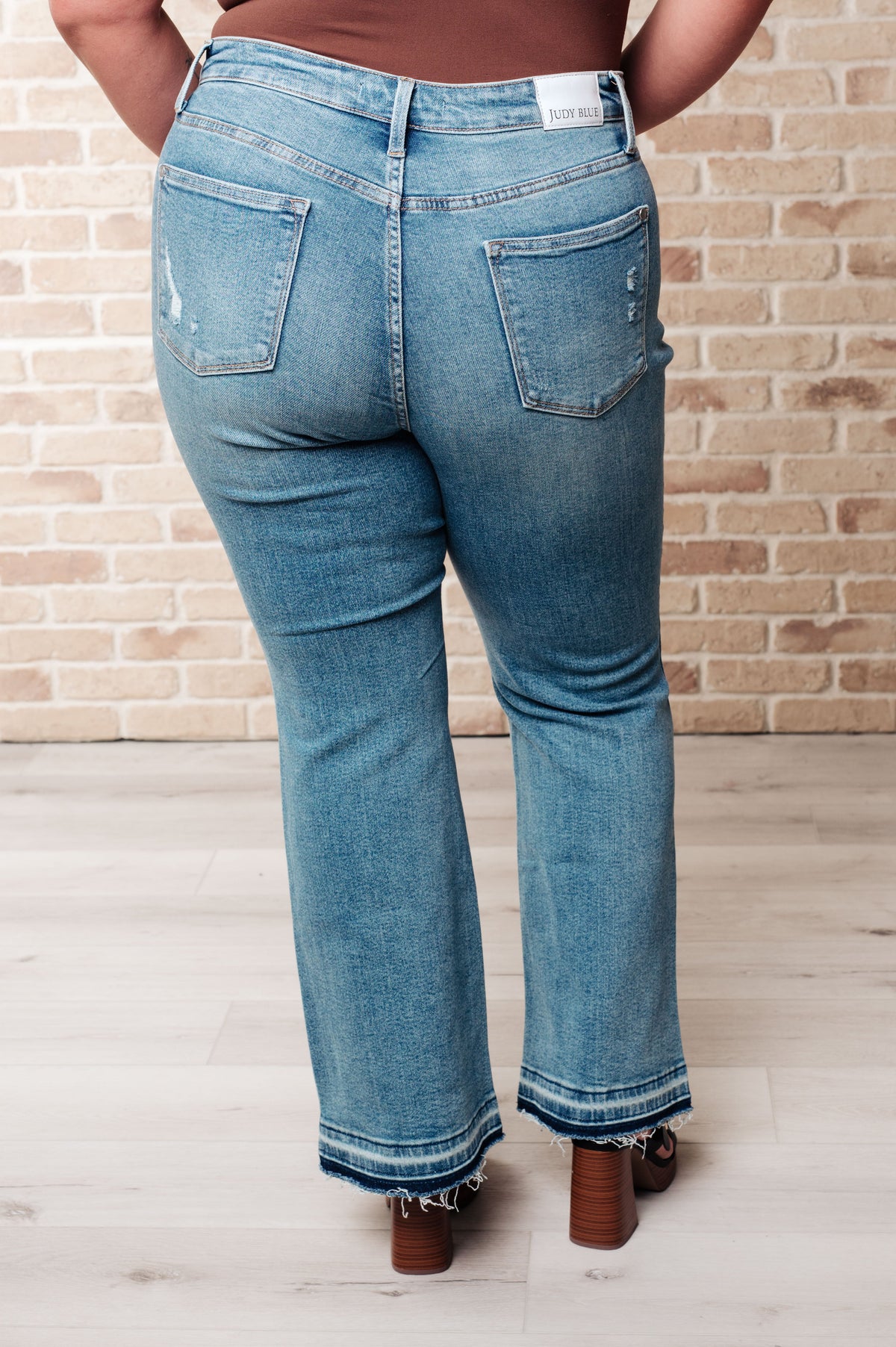 Judy Blue Isla Mid Rise Distressed Released Hem Bootcut Jeans Jeans